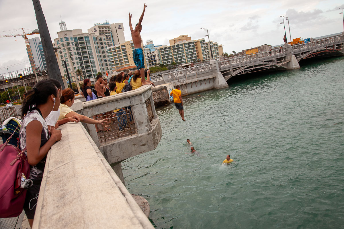 Daredevil Teens Jumping off Puente San Antonio Bridge, San Juan