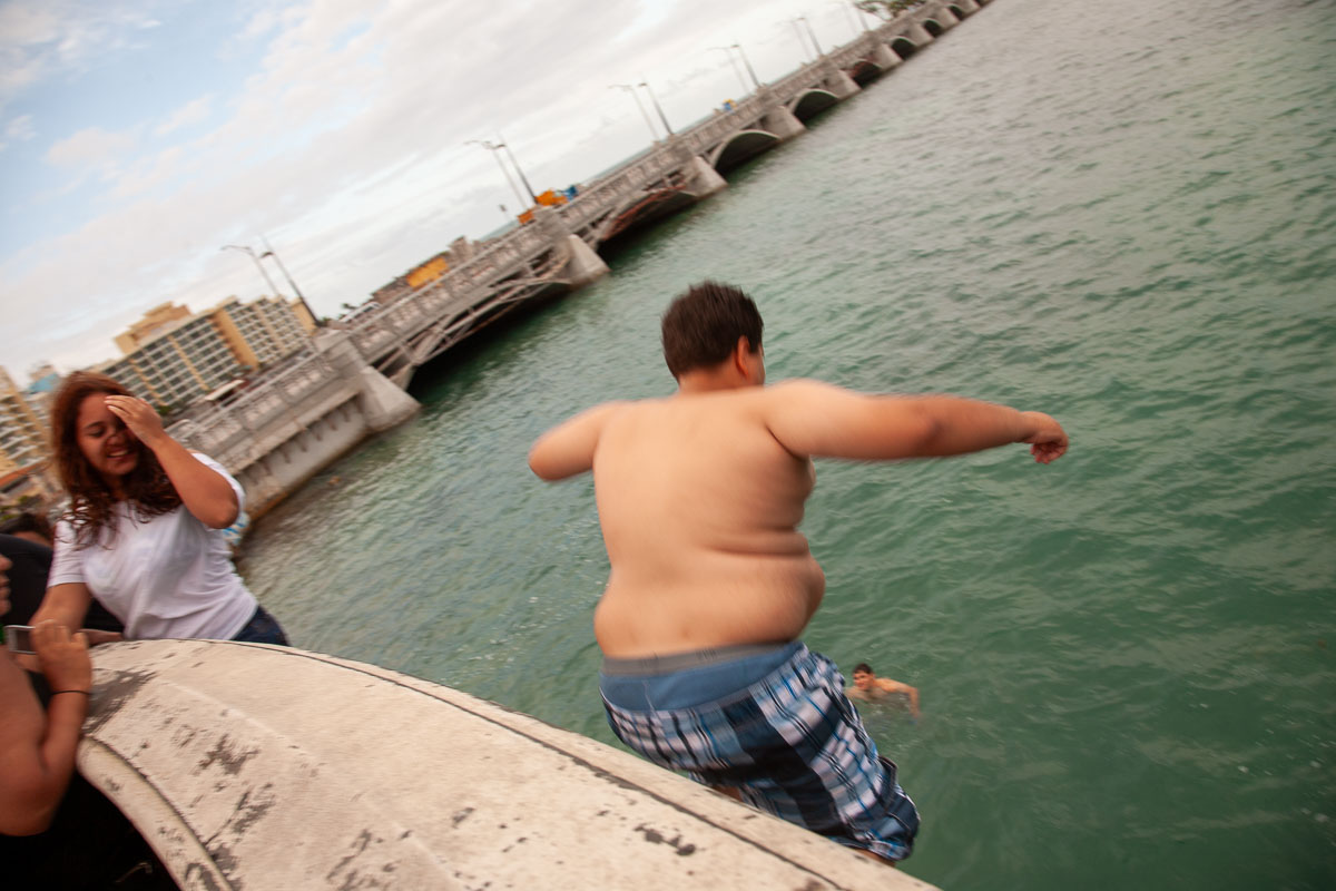 Boy Jumping off Puente San Antonio Bridge, San Juan