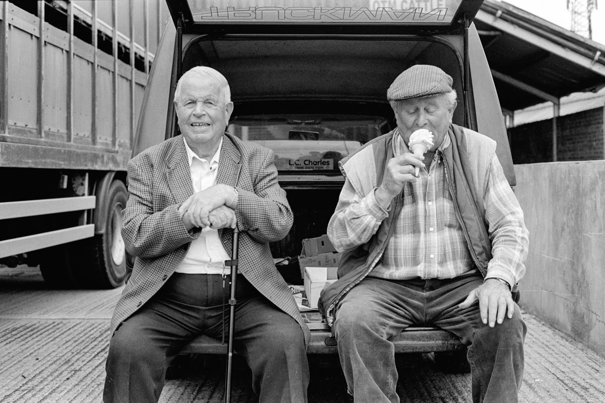 Farmers Eating Icecream outside Hereford Poultry Auction 