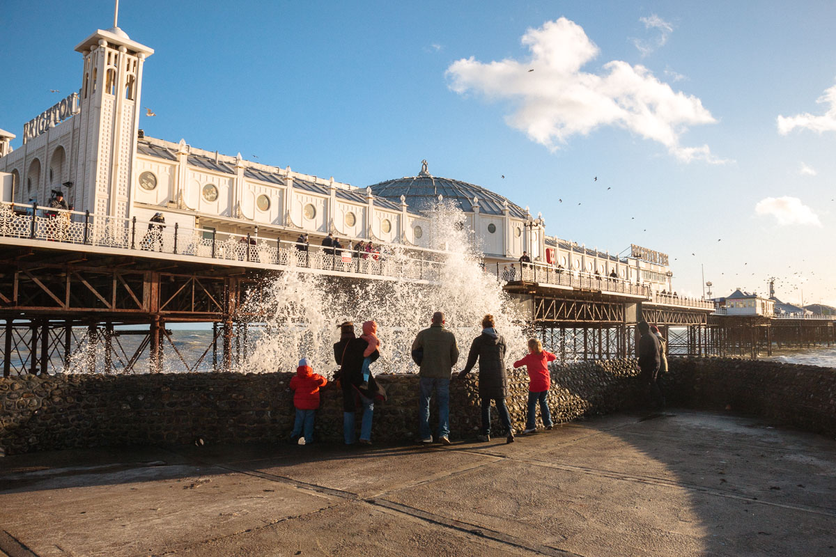 Brighton Pier today attracts large crowds enjoying the vibrant atmosphere along the lively seafront