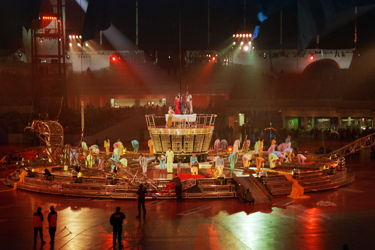 Performers captivate the audience on the central stage of the Millennium Dome