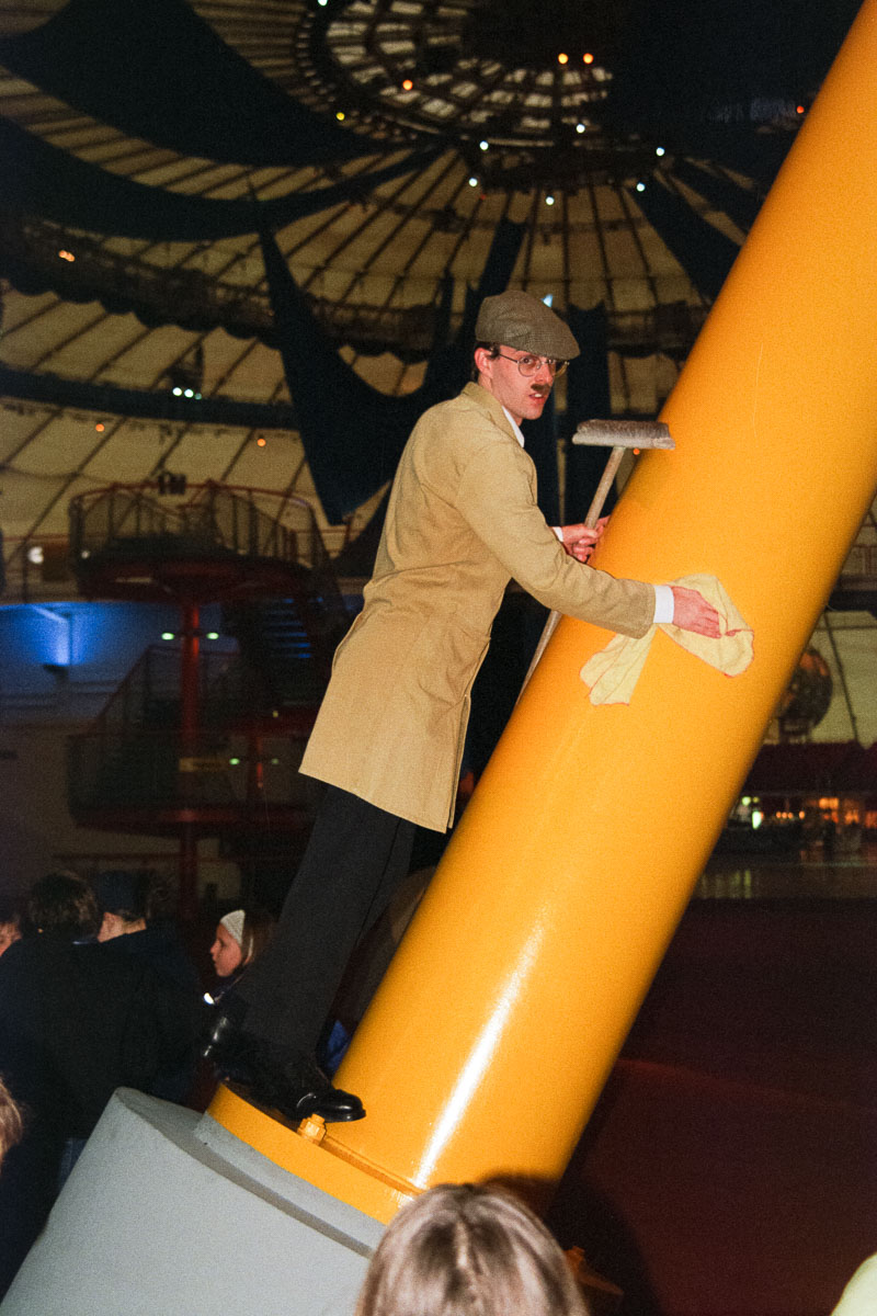 A staff member dressed as a cleaner inside the Millennium Dome exhibition