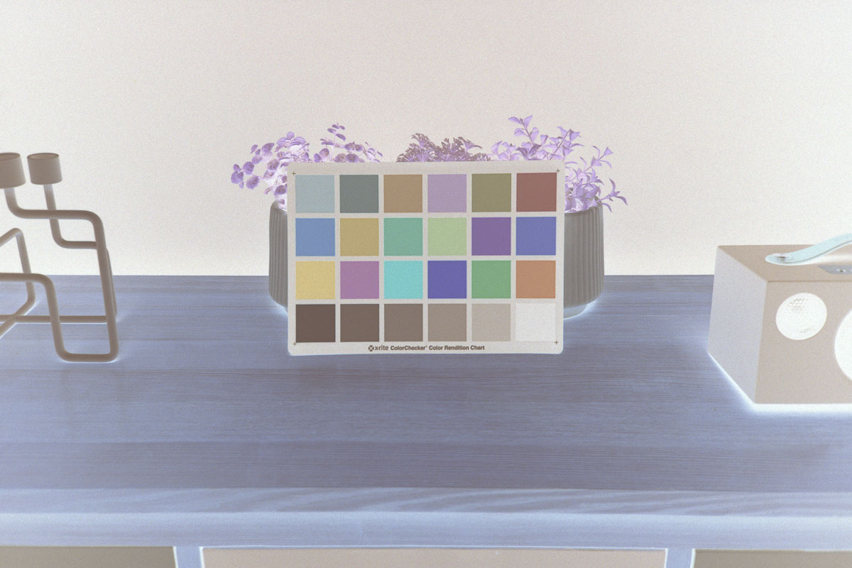 Invert colour negatives in Photoshop by correcting the densities of each colour channel.