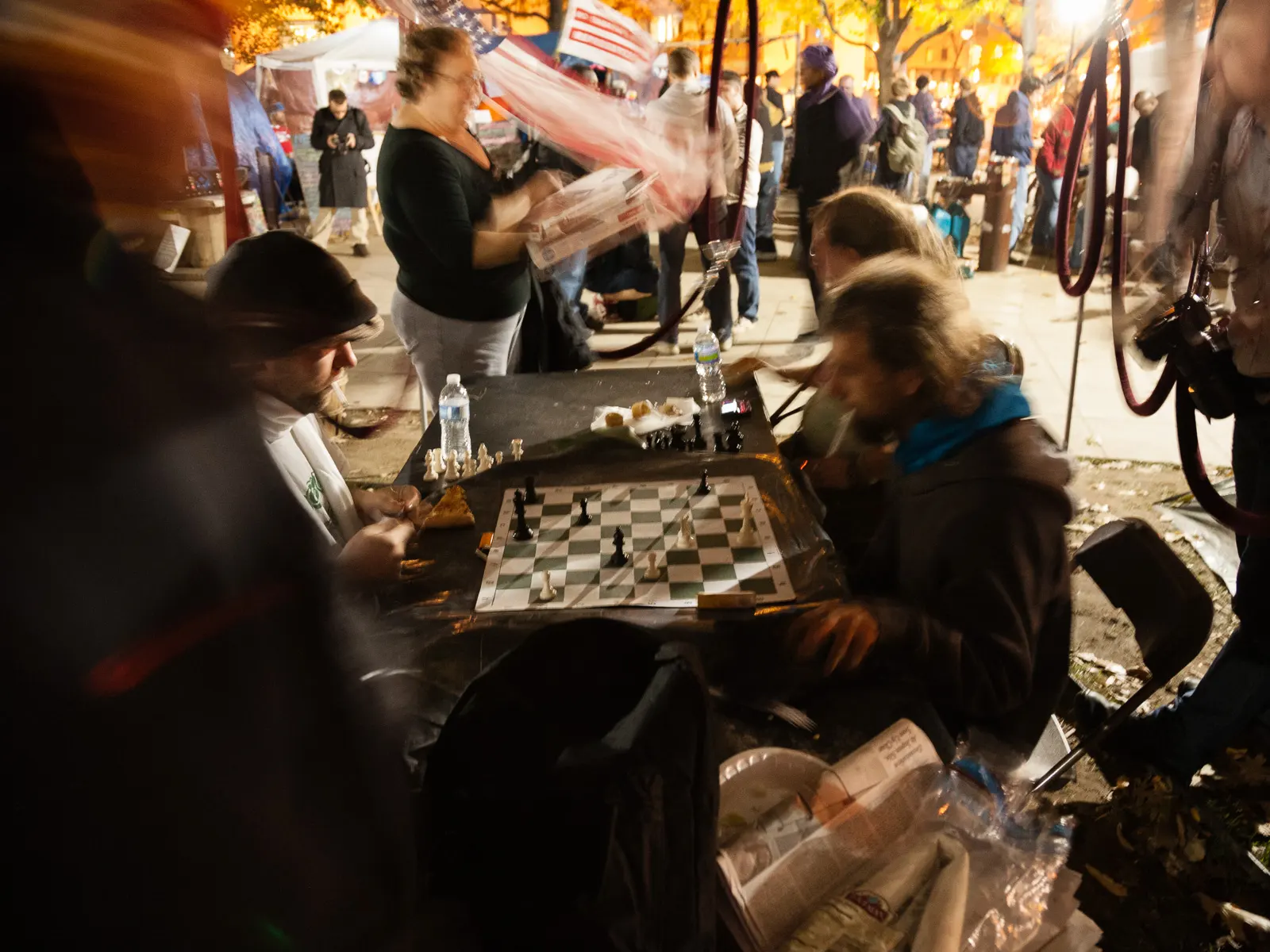 Protesters passing the time by playing chess.