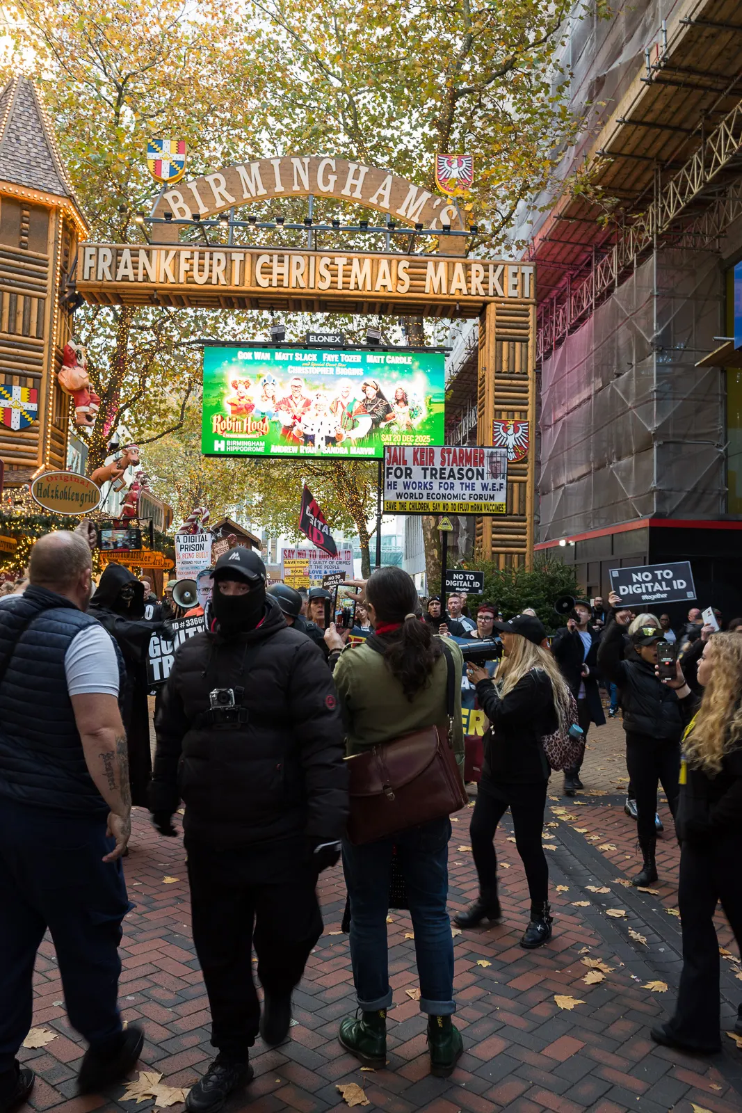 Protesters move through the Frankfurt Christmas Market