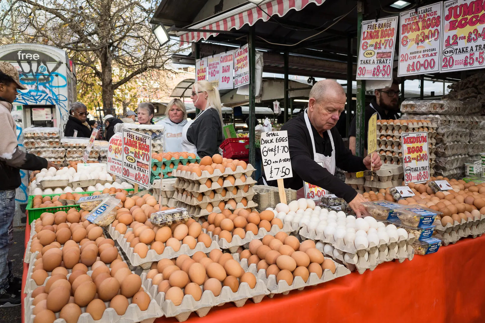 Vendors arrange their stock at the market.