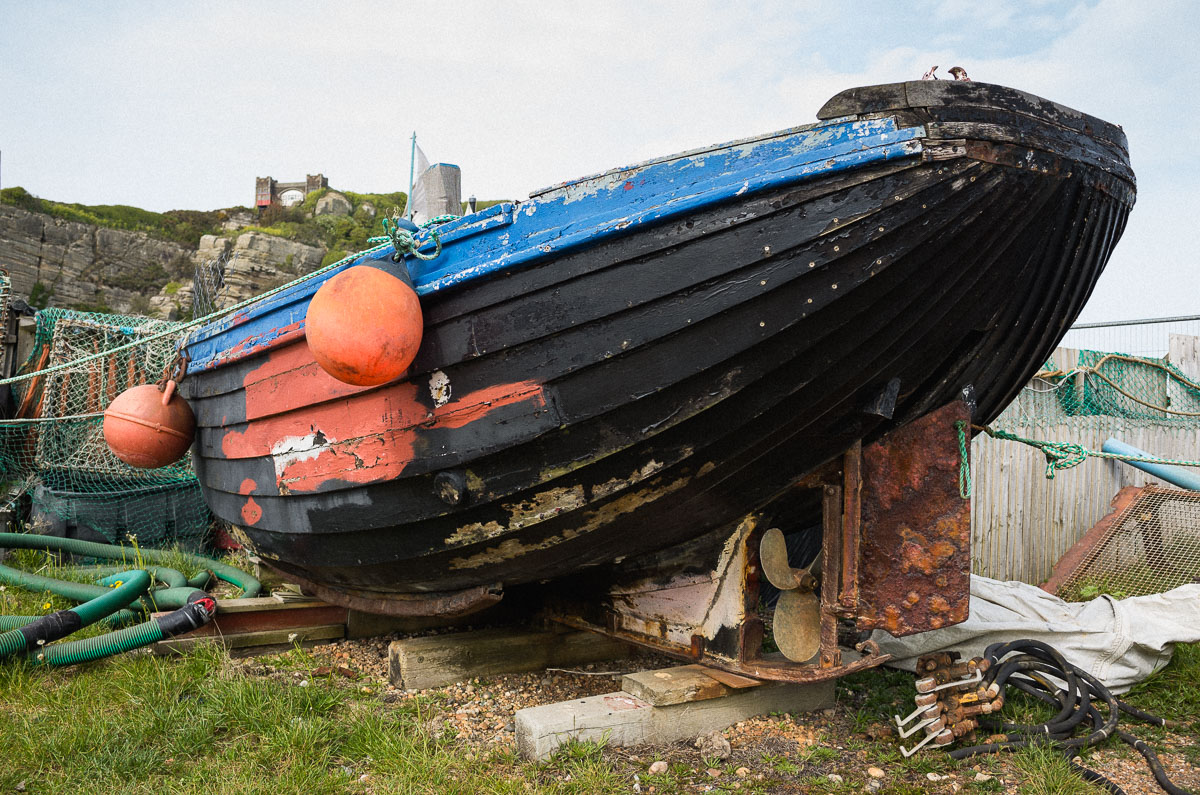 Close-up shot of the hull of an old wooden fishing boat on Hastings Beach