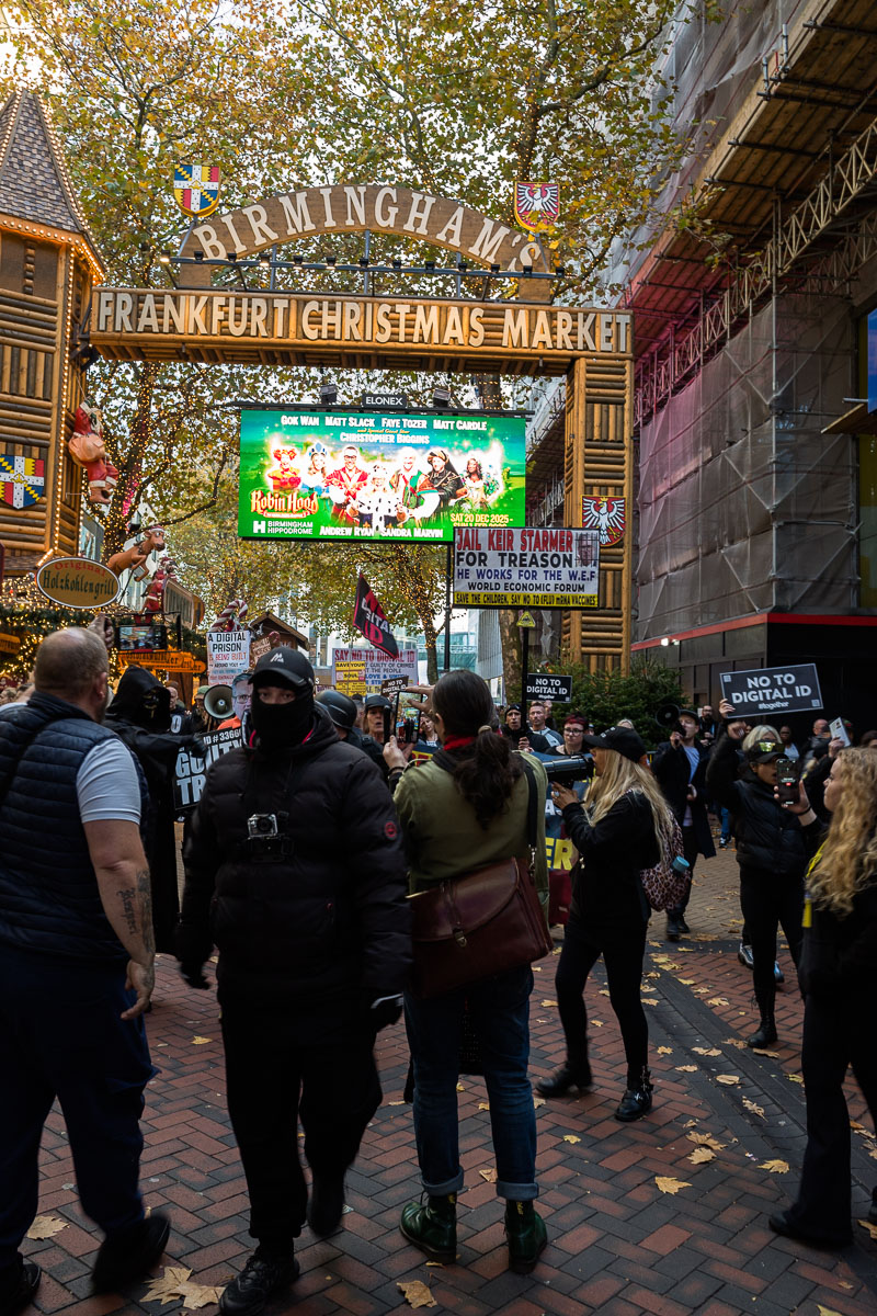 Protesters move through the Frankfurt Christmas Market