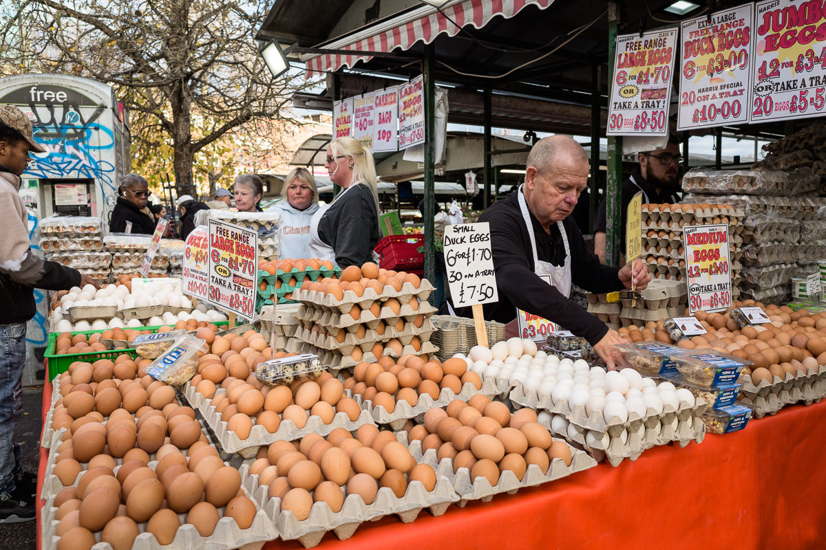 Vendors arrange their stock at the market