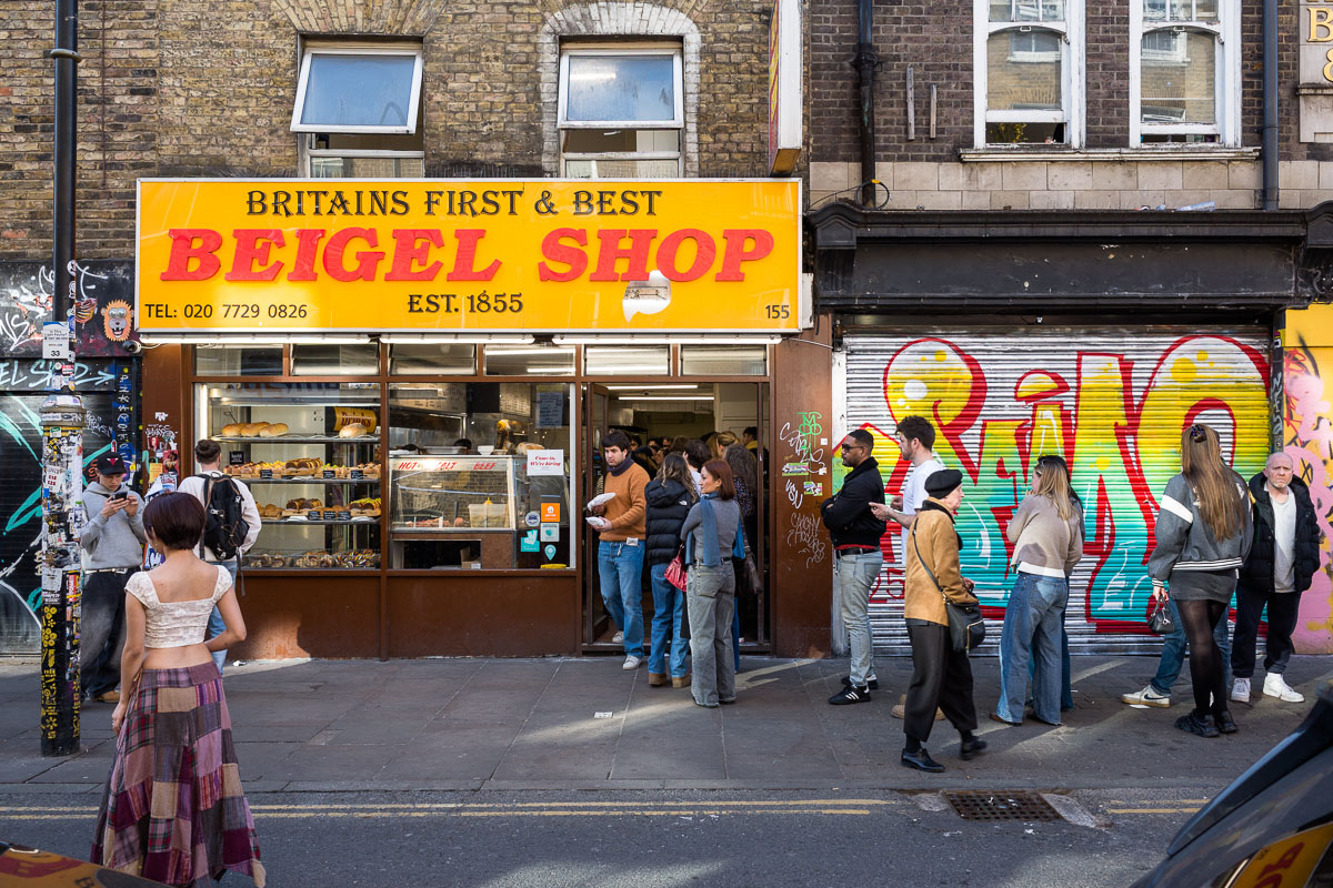 People queuing outside Brick Lane's well-known bagel shop
