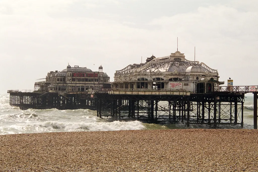 West Pier in 1999, intact but weathered, with its entrance sign visible