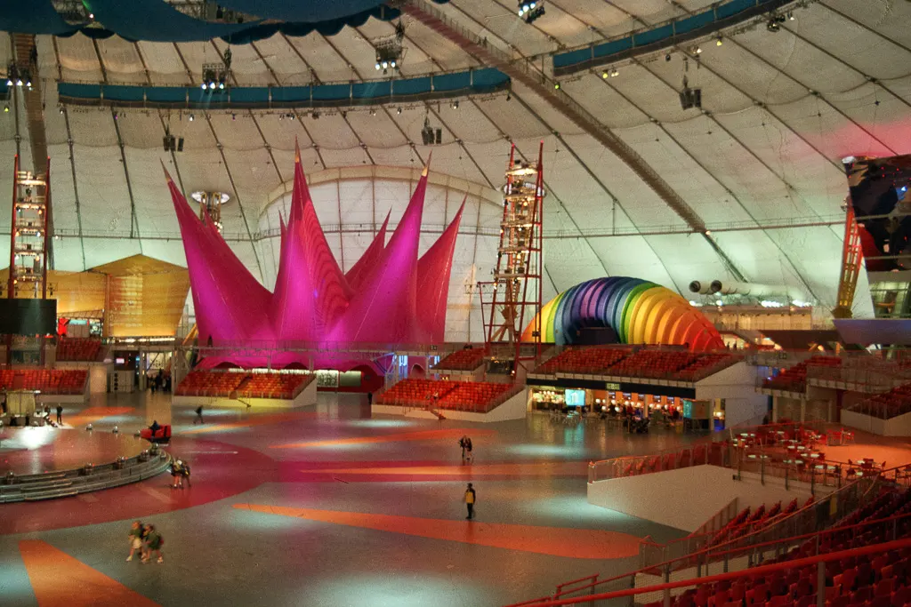 The vibrant Our Town Stage next to the rainbow-coloured Rest zone inside the Millennium Dome