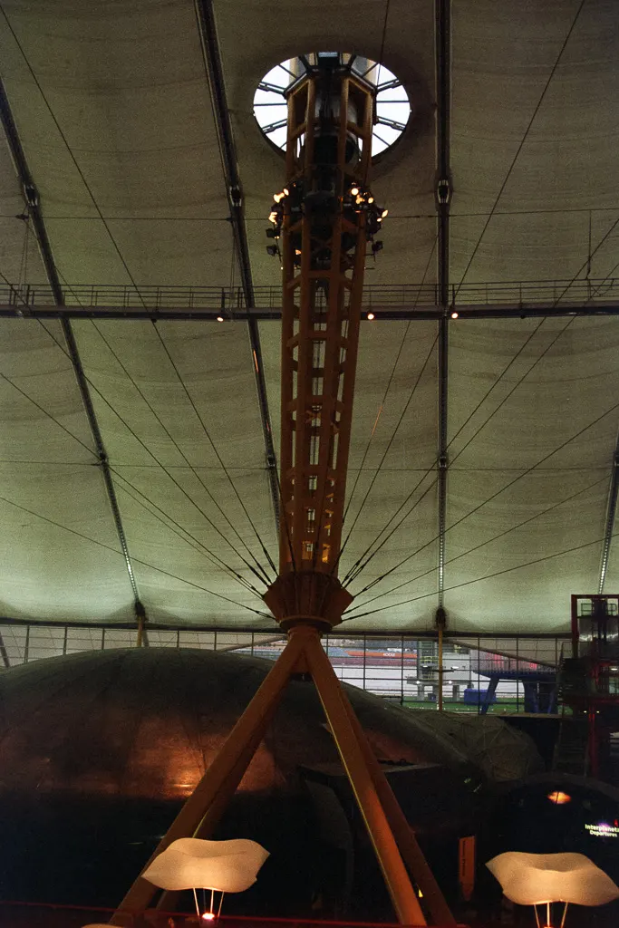 One of the twelve yellow support masts holds up the Millennium Dome roof
