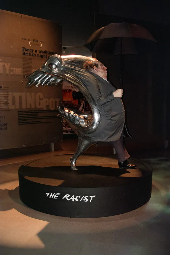 Gerald Scarfe's "The Racist" sculpture inside the Millennium Dome