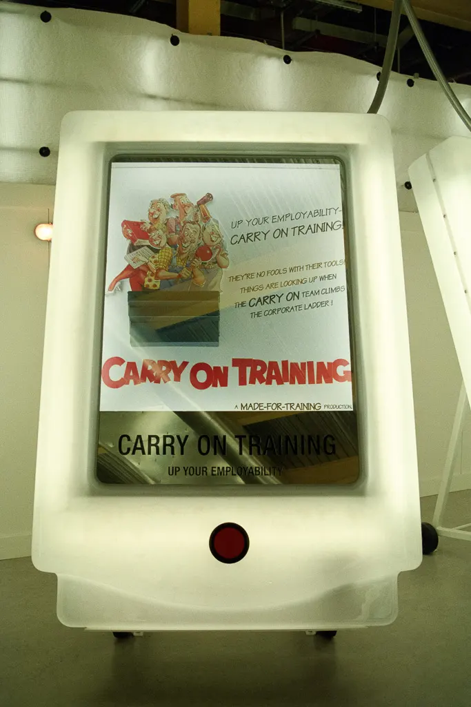 A tongue-in-cheek motivational poster—styled like an advert for a Carry On film—parodying workplace clichés